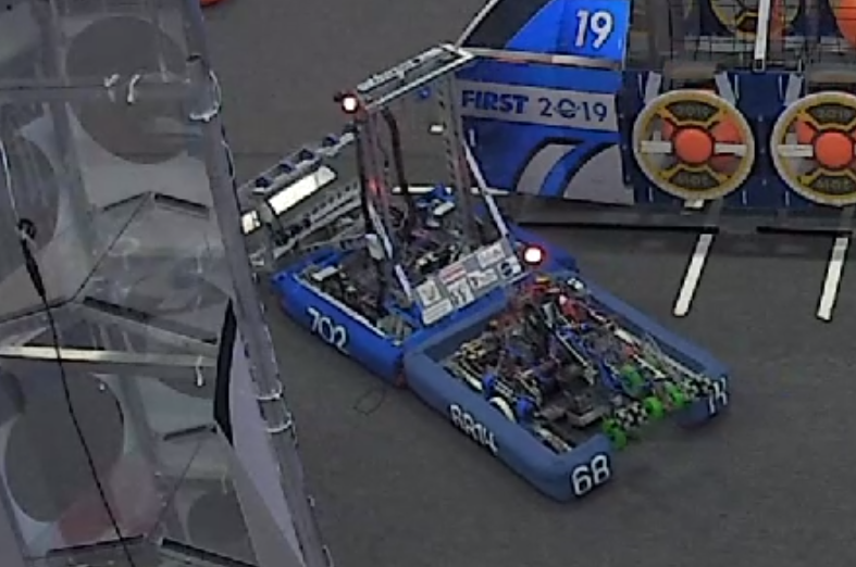 One Robot Pushing A Damaged Robot